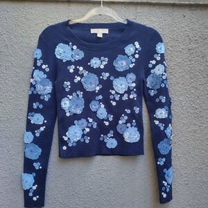 Michael Kors sweater with plastic flowers